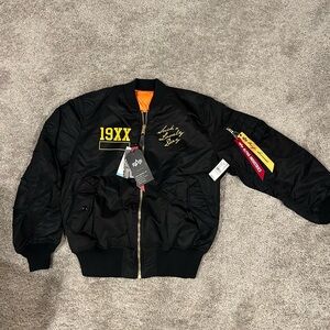 Alpha Industries Black Jacket with Yellow Lettering
